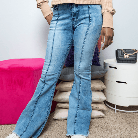 Bell Bottom Distressed Jeans with Ripped Hem - Howse Fashion Company